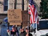 Protesters Wave Flag of Support
