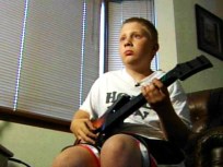 12-Year-Old Becomes Guitar Hero Champ