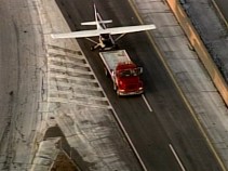 Plane Towed Off Turnpike