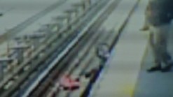 Baby Rescued From Tracks