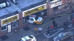 Cab Crashes Into Sneaker Store