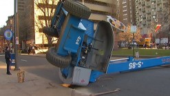 Cherry Picker Tips Over in Center City