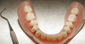 Toothless Woman Robs Bank for Denture Money