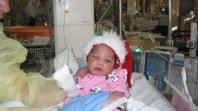 Baby Girl Found Alive, in a Box