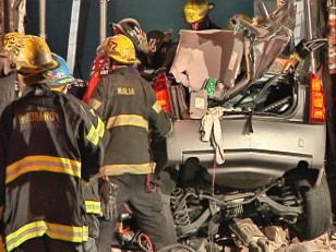 Caddy Crashes Into Building, Driver Dies