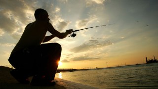 Teen Struck by Train While Fishing Dies