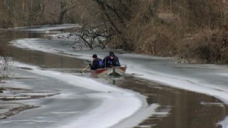 Divers Use Sonar in Water Search for Missing Bartender