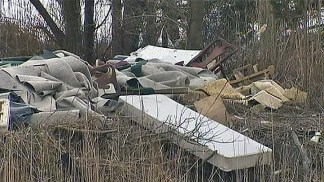 Debris Left by Sandy Angers Woman