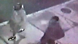 Police Search for Second Suspect in Officer's Murder