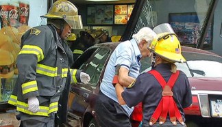 Raw Video: Man Walks Away From Fast Food Crash
