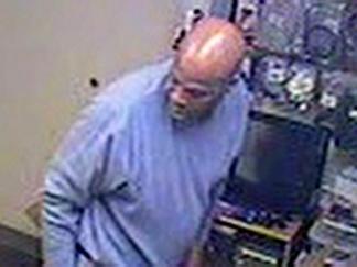 Surveillance Video: Theif Caught in the Act