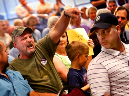 Voters speaks out against health care reform during Rep. John Dingell's town hall meeting in Romulus, Mich. on Thursday. Voters speaks out against health care reform during Rep. John Dingell's town hall meeting in Romulus, Mich. on Thursday.