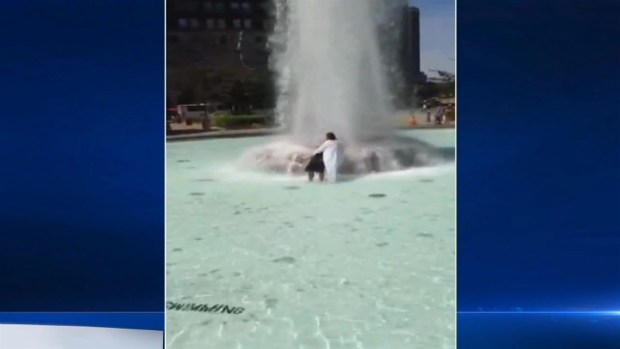 [PHI] RAW: Philly Jesus Baptizes Tourist in Love Park