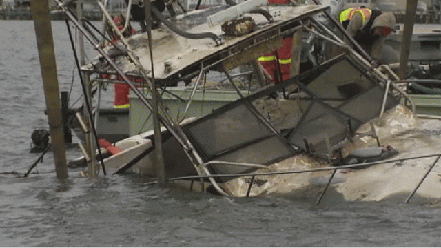 Sunken Boat Hoisted Out of Bay in Ocean County