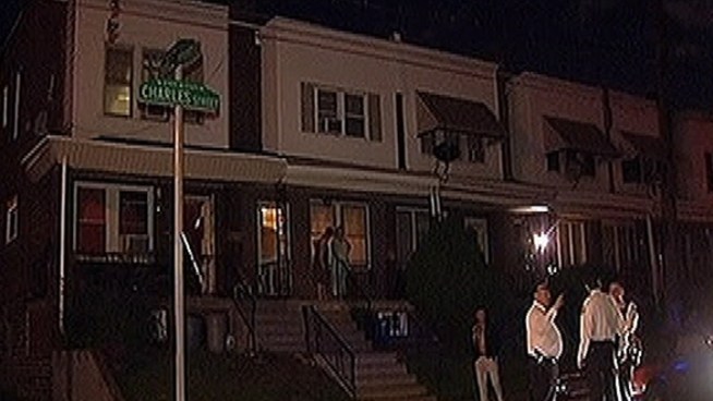 The 61-year-old victim is in stable condition after she was grazed by a bullet shot from a block away in Frankford.