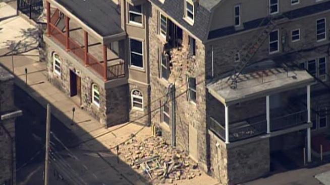 Chopper 10 up over a wall collapse at <a href=