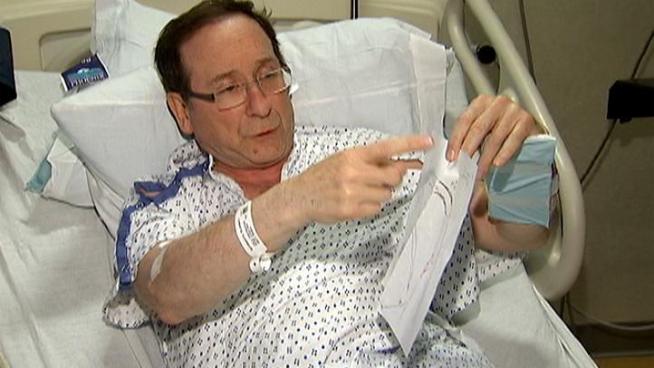 Always the scientist, NBC10 Meteorologist Glenn Hurricane Schwartz shows co-anchor Renee Chenault-Fattah a diagram of the blockage in two of his arteries. Glenn had successful double bypass heart surgery today. Renee talked to both Glenn and his doctor last night because Glenn has an important message for viewers about what might have saved his life. <br /><a href=
