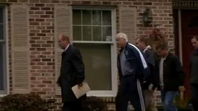Jerry Sandusky Taken Out of Home in Handcuffs
