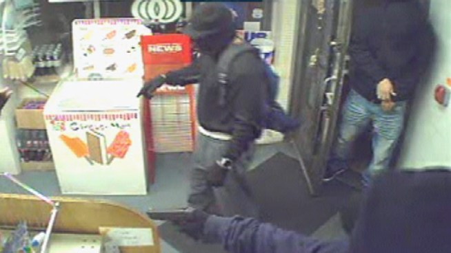 Armed men hold up a Frankford pharmacy Thursday night and make off with drugs and money. NBC10's Nefertiti Jaquez shows us the dramatic video.