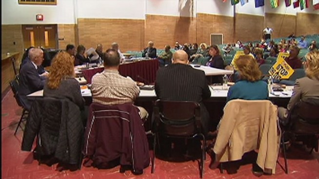 School district officials have approved a plan to merge elementary schools into new school 