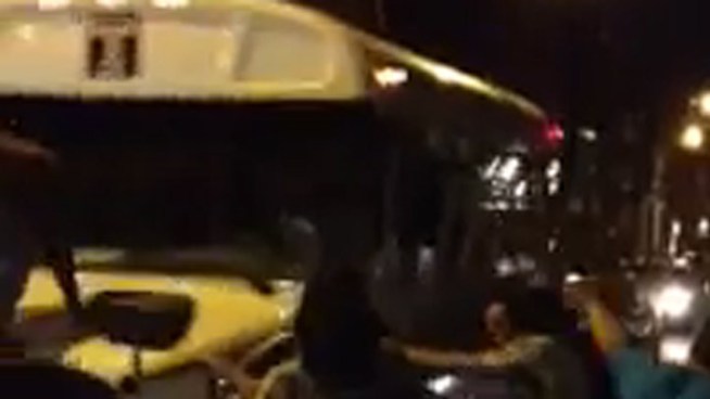 A wild scene was caught on video of partiers attempting to flip over a Temple shuttle bus. Police say one person was arrested. Warning: the video contains harsh language and may not be suitable for younger viewers.