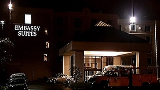 Police are searching for two men that allegedly tied up two employees and a guest while they robbed Southwest Philly.