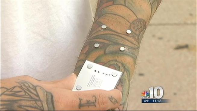 It sounds like something out of a sci-fi movie. A man placed his iPod Nano on his wrist, and it stuck to his skin magnetically, without straps. 21-year-old Dave Hurban of Williamstown, Gloucester County, is a body peircer who implanted four piercings under his skin using a device called a dermal punch, with four tiny magnets on the outside of his skin. He put four more magnets on the back of his iPod Nano, and now he's got a strapless wristwatch/media player. The Association of Professional Piercers, however, does not approve. The organization claims that what Hurban did is illegal and could lead to infection.