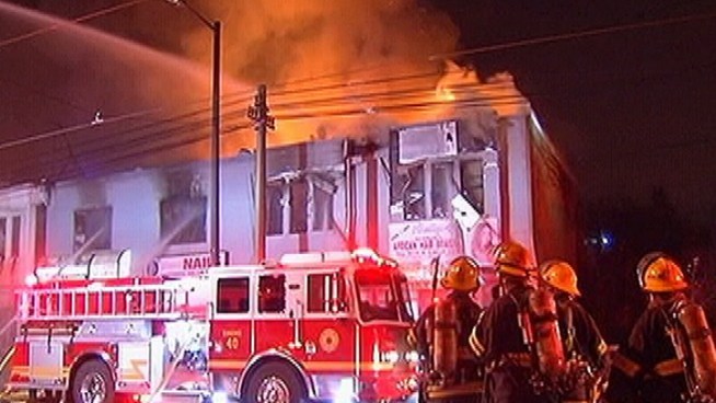 The fire broke out around 12:30 a.m. Tuesday on the 6000 block of Woodland Avenue. The blaze damaged or ruined at least seven businesses.