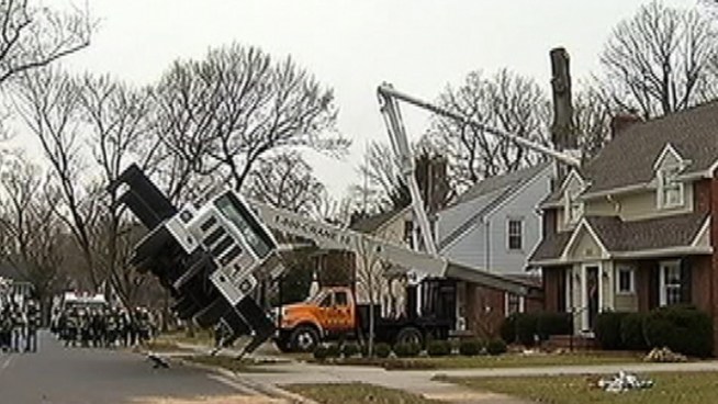 A crane being used in Haddonfield, NJ tipped over during a tree cutting operation. The driver had to be rescued. NBC10's Daralene Jones reports.