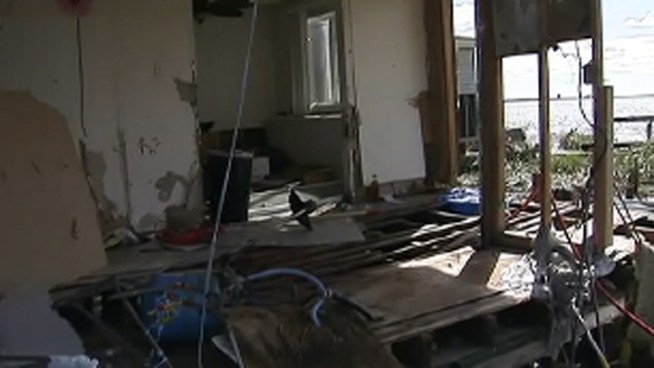 At least two dozen homes were destroyed in the Pleasantville community of Lakes Bay. NBC10's Ted Greenberg spoke to property owners who not only lost their homes to the storm, but now they have looters to worry about. 
