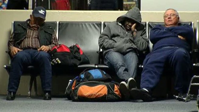 NBC10's Denise Nakano talks to travelers stuck in Philly International or recently arrived after delays caused by the wet weather Wednesday.
