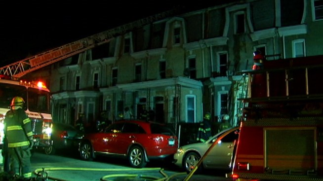 The woman was trying to escape a fire in her Germantown home when she jumped from a 3rd story window.