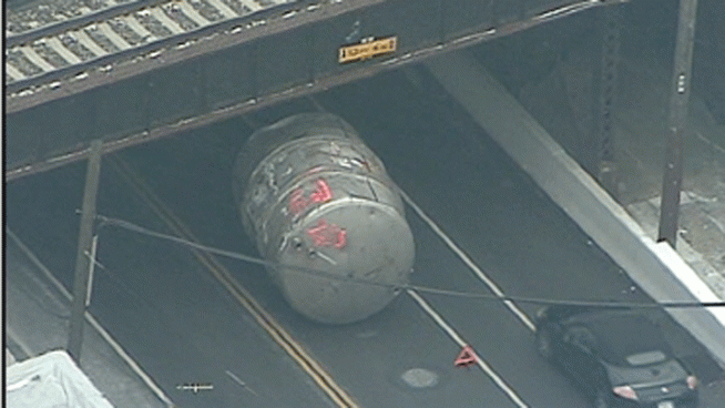A accident involving a truck driver leads to a bizarre sight on a Northeast Philadelphia roadway. A steel tank dropped onto the road, after police say a truck driver hit an overpass on his way to the scrap yard. NBC10's Claudia Rivero reports from the scene.