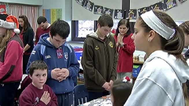 Moments of silence were held on Friday at schools and communities around the country to remember the 26 lives lost in the Newtown school shooting. NBC10's Monique Braxton was at Cardinal John Foley Regional Catholic in Havertown during their observance.