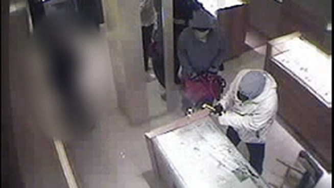 Surveillance video has been released of a smash and grab burglary inside a high-end watch store at the King of Prussia Mall. It happened Friday around 8 p.m. at the Tourneau Inc. watch store. Police say five masked men entered the store and allegedly restrained the security guard at gunpoint as they smashed glass display cases with sledge hammers and remove numerous watches.