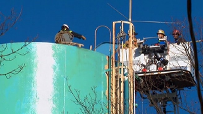 Officials say three subcontractors with Corosion Control were working on a water tower in Lower Providence Township when they fell into the tank. One of the workers died. NBC10's Monique Braxton reports.
