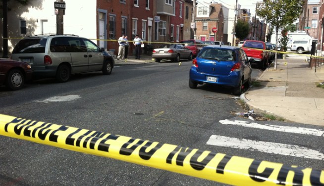 A man was found on the ground on 16th and Catharine, allegedly involved in a shootout with another man who is still on the loose. Five area schools were locked down as a safety precaution.