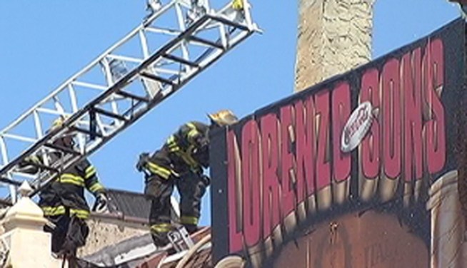 Flames broke out Wednesday morning at Lorenzo and Sons popular pizza shop on South Street. One firefighter suffered a minor injury in the blaze.
