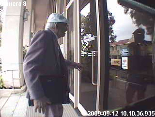 Well-Dressed Elderly Gent With Oxygen Tank Robs Bank