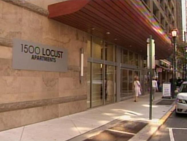 A man cornered an elderly woman in the elevator of a posh Center City high-rise, stole cash and credit cards and then kicked her to the ground.