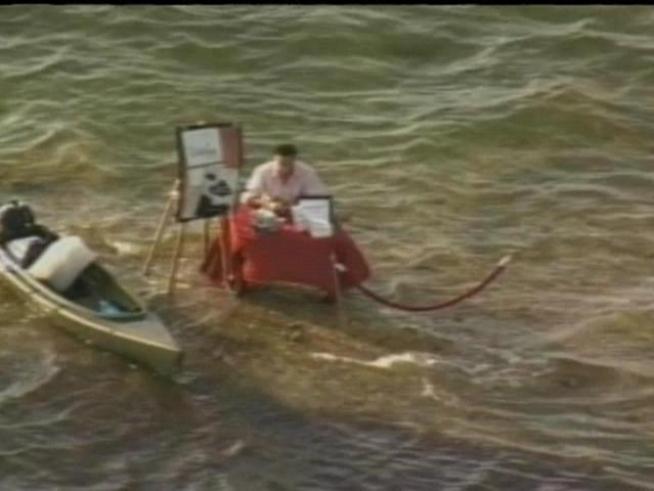 Sean Kenniff, a member of the original Survivor castaways, paddled to the infamous Miami sandbar for a book signing Tuesday.