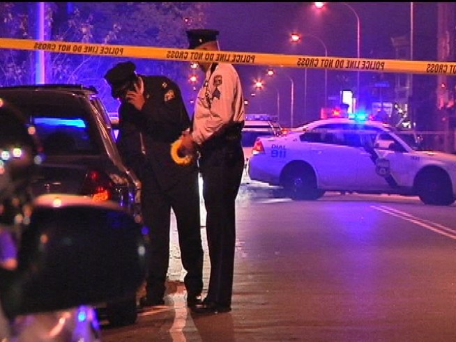 Officer Dragged Down Street; Police Search for Suspect