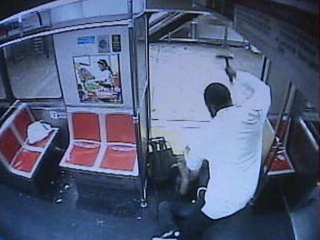 A mentally-disturbed man pulled out a hammer and attacked a subway rider.