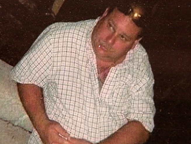 Former Cop Charged With Murder Surrenders