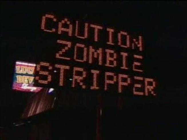 A hacked freeway sign in Oregon lets drivers know to be on the lookout for zombie strippers.