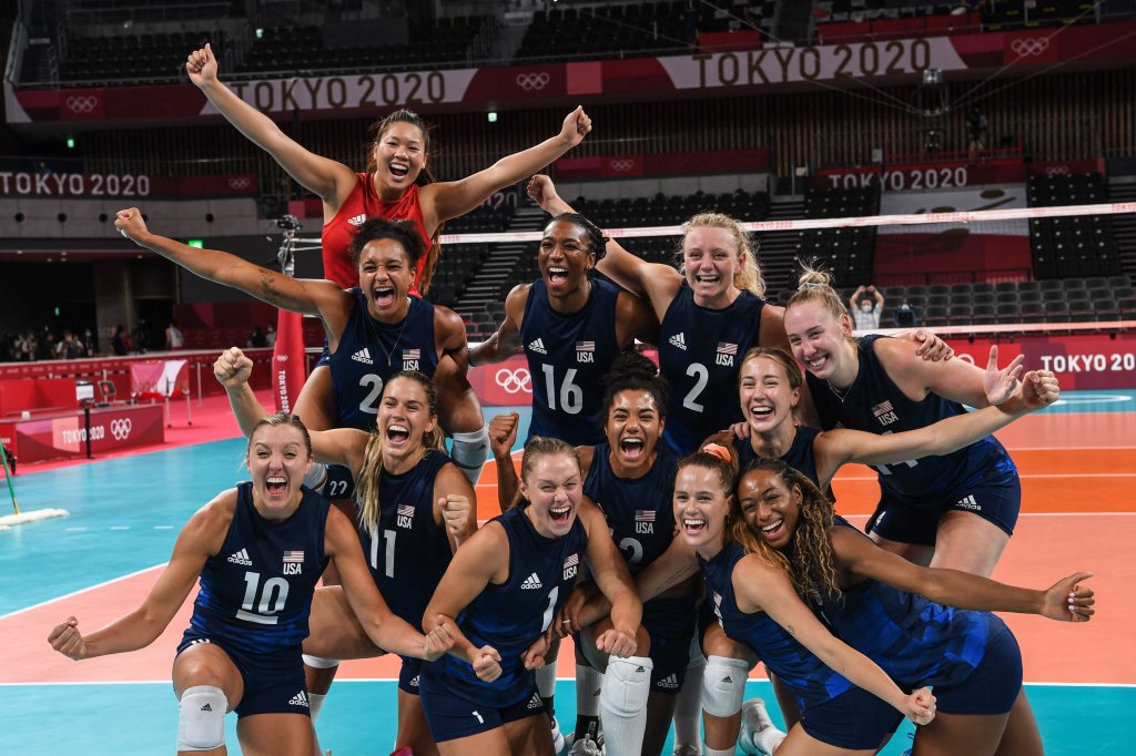 Team USA celebrates their victory in the women's semi-final volleyball match between USA and Serbia during the Tokyo 2020 Olympic Games at Ariake Arena in Tokyo on Aug. 6, 2021.