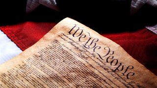 US Constitution and flag.