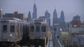Two SEPTA trains pass each other in Philadelphia.