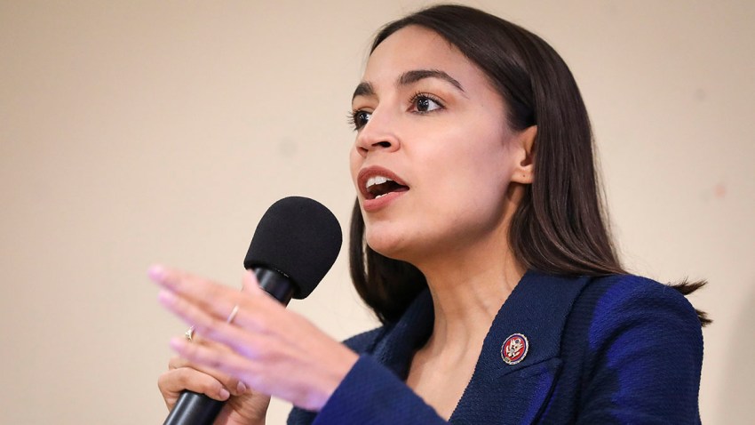 In this Oct. 3, 2019, file photo, U.S. Rep. Alexandria Ocasio-Cortez (D-NY) speaks during a town hall meeting at the LeFrak City Queens Library in the Queens borough of New York City.