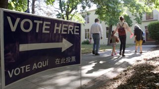 In this file photo, voters walk to a precinct place at the Sierra 2 Center for the Arts and Community to cast their ballots Tuesday, June 5, 2018, in Sacramento, Calif.